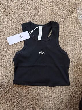 Alo Yoga Aspire Tank in black.